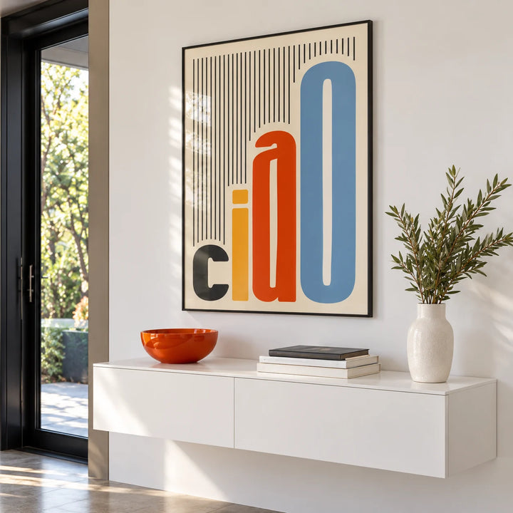 Italian Wall Art, framed on the wall of a bright entryway with a white side table