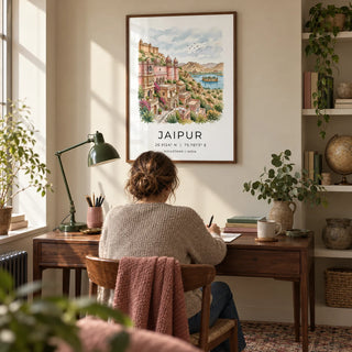 Jaipur Art Print, framed on the wall of a quiet home study for a well-travelled adult in a UK flat with a sandy beige wall and a fitted shelf in an alcove