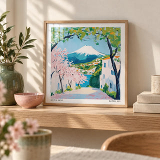 Japan Poster, a small A4 framed print leaning on a pale oak shelf in a living room