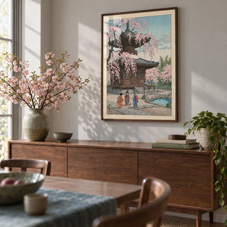 Japanese Cherry Blossom Art Print, framed on the wall of a calm dining room with a pale grey wall