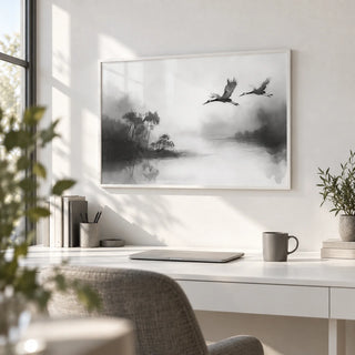 Japanese Cranes Flying Art, framed on the wall of a bright home office with a white wall