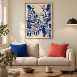 Japanese Market Art Print, framed on the wall of a modern living room in a UK city flat with warm cream plaster walls and an oak floor