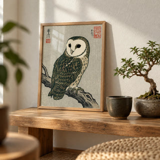 Japanese Owl Art, a small A4 framed print leaning on a low oak bench in a living room