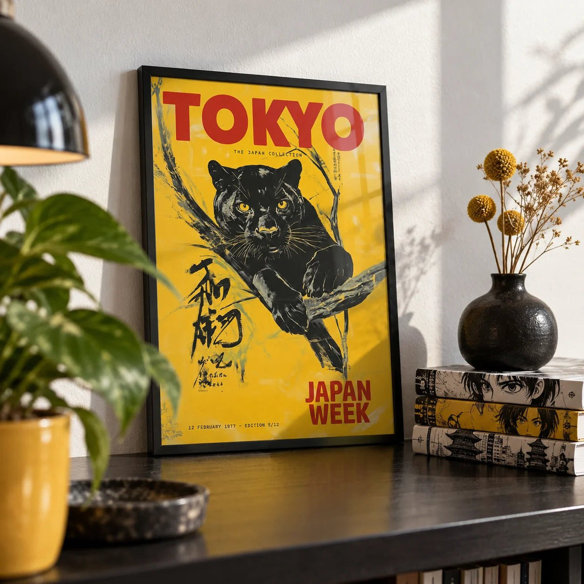 Japanese Retro Poster, a small A4 framed print leaning on a black shelf in a living room
