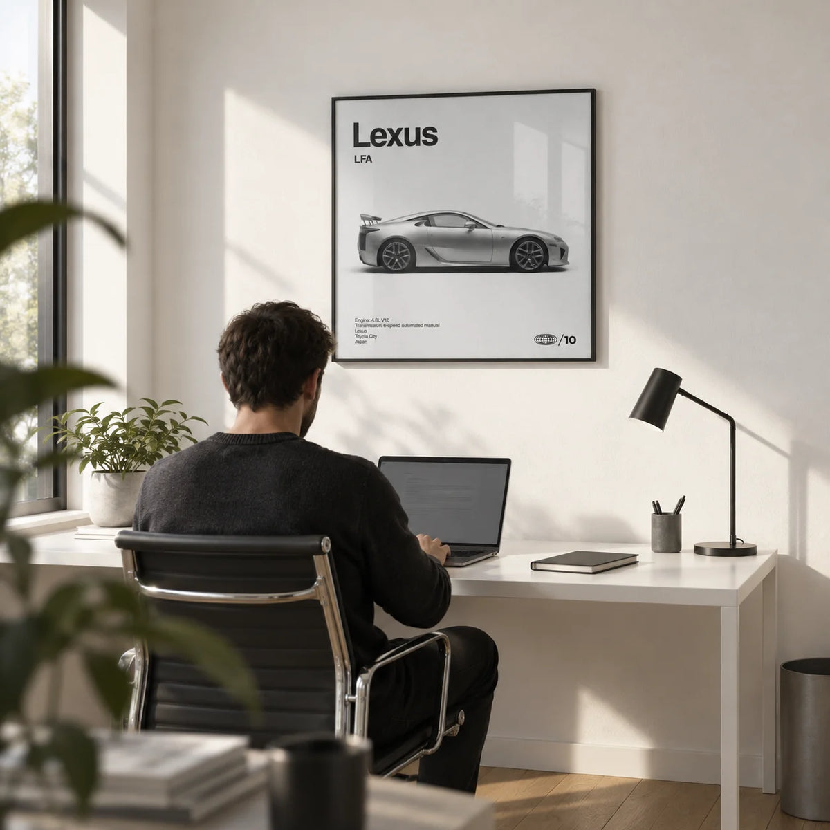 Japanese Supercar Poster, framed on the wall of a minimal home study with a white wall and a light oak floor