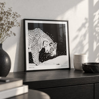 Japanese Tiger Art, a small A4 framed print leaning on a black shelf in a living room