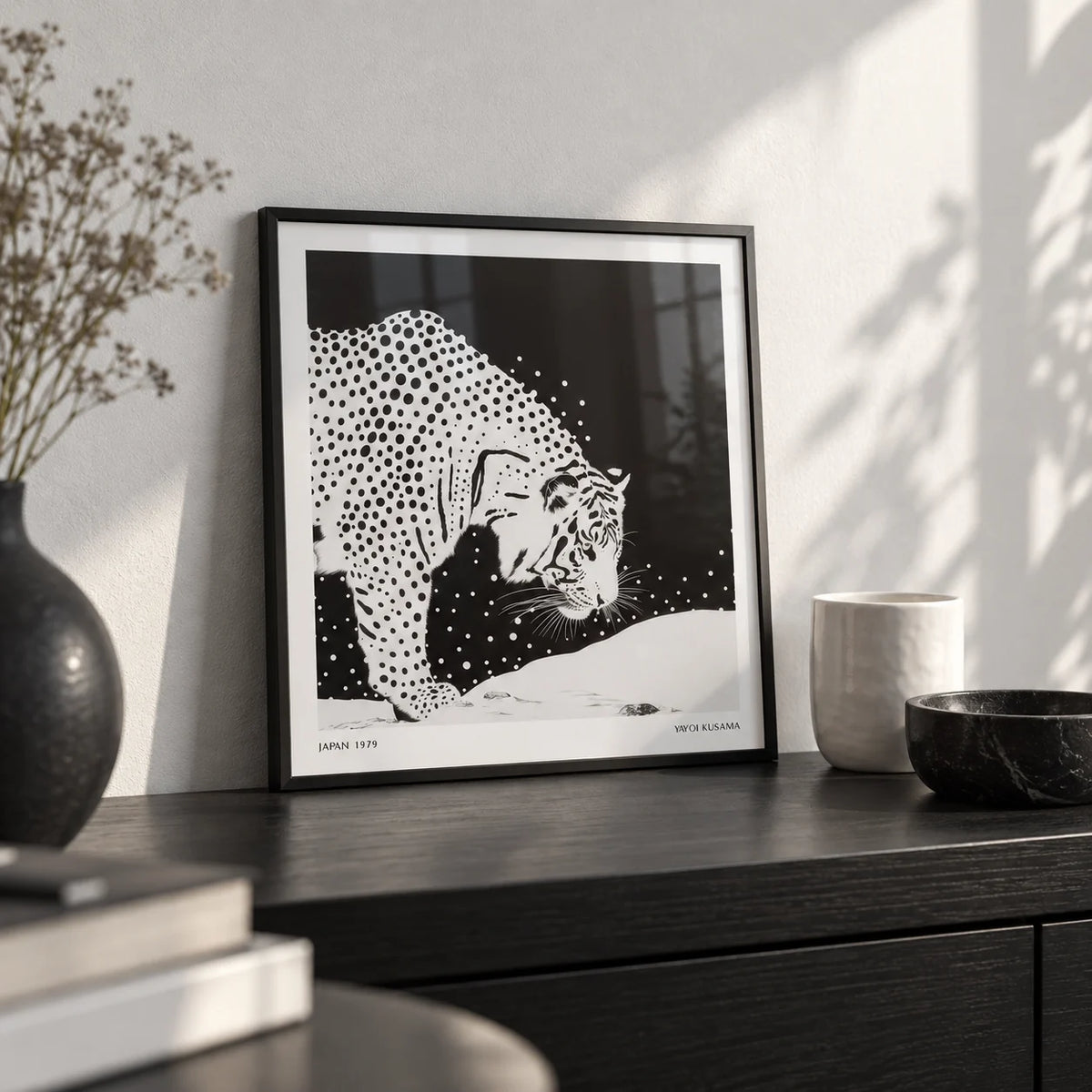 Japanese Tiger Art, a small A4 framed print leaning on a black shelf in a living room
