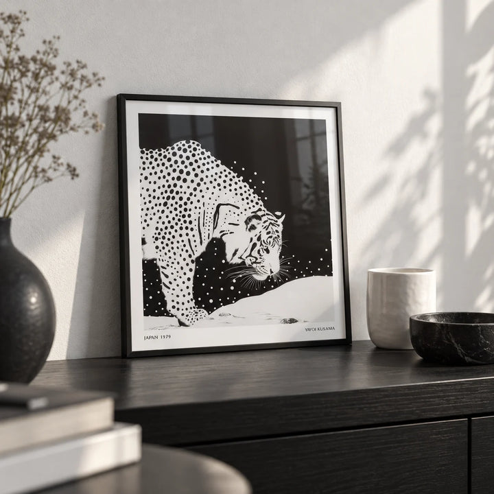 Japanese Tiger Art, a small A4 framed print leaning on a black shelf in a living room