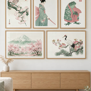 Japanese Wall Art Set hung at eye level above a light oak sideboard: Owl on Ginkgo, Japanese Samurai Woman and Frog in Kimono shown framed side by side (frames not included)