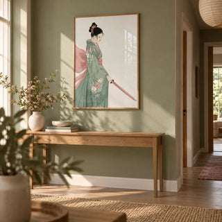 Japanese Woman Art Print, framed on the wall of a calm hallway with a sage green wall