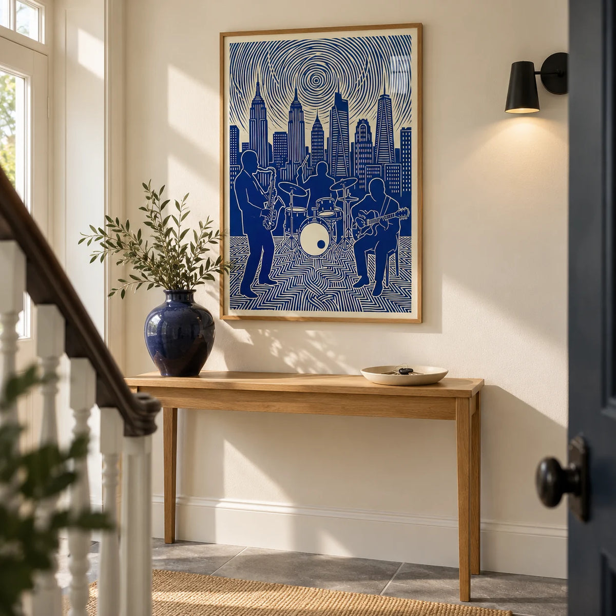 Jazz Band Wall Art, framed on the wall of a bright entrance hallway in a renovated UK terrace with a warm ivory wall and simple grey stone floor