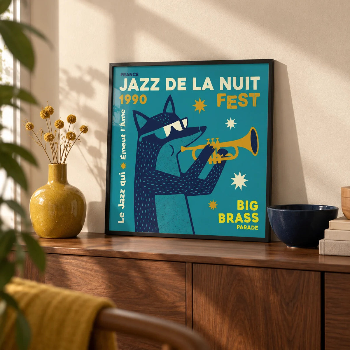Jazz Festival Art Print, a small A4 framed print leaning on a walnut sideboard in a living room
