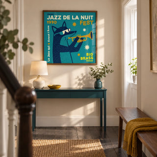 Jazz Festival Art Print, framed on the wall of a welcoming hallway in a renovated UK terrace with cream plaster walls and plain dark floorboards