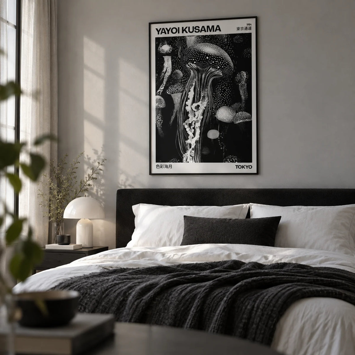 Jellyfish Art, framed on the wall of a calm modern bedroom with a soft grey wall