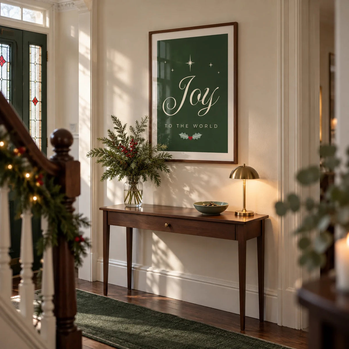 Joy to the World Print, framed on the wall of a festive entrance hallway in a Victorian terrace with cream painted walls and simple original cornicing