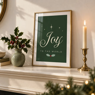 Joy to the World Print, a small A4 framed print leaning on a shelf in a living room
