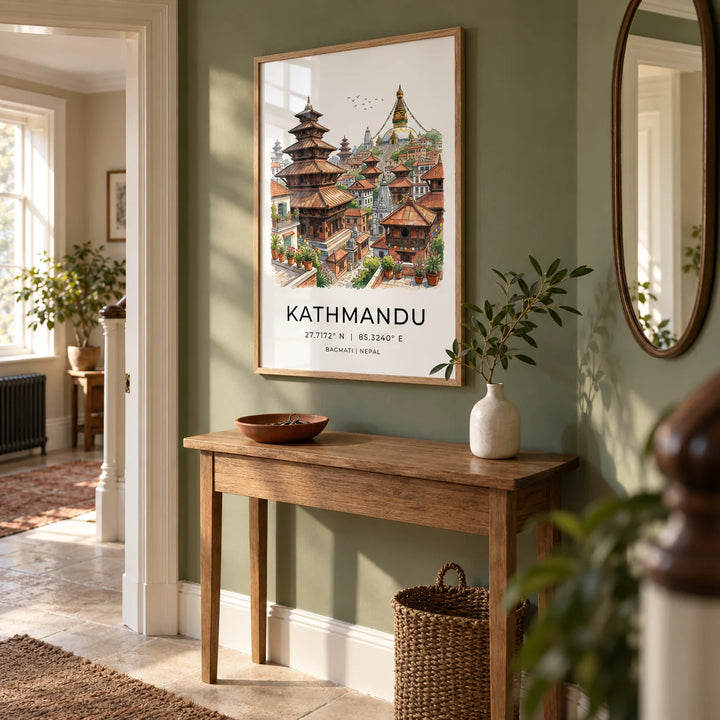 Kathmandu Art Print, framed on the wall of a welcoming hallway in a UK period flat with a muted leafy green wall and pale stone flooring