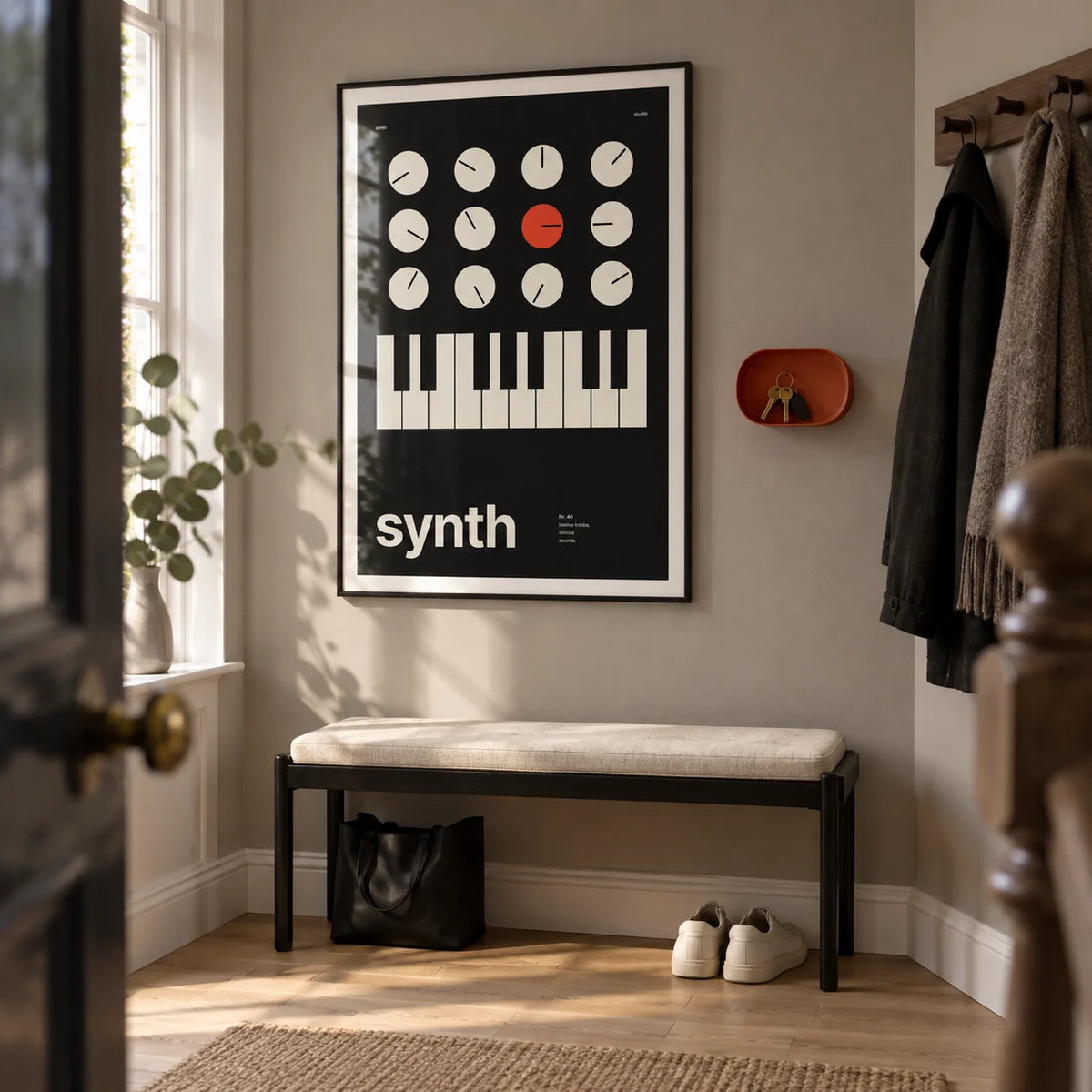 Keyboard Poster, framed on the wall of a compact entrance hallway in a music lover's UK terrace with a warm grey wall and pale oak floor