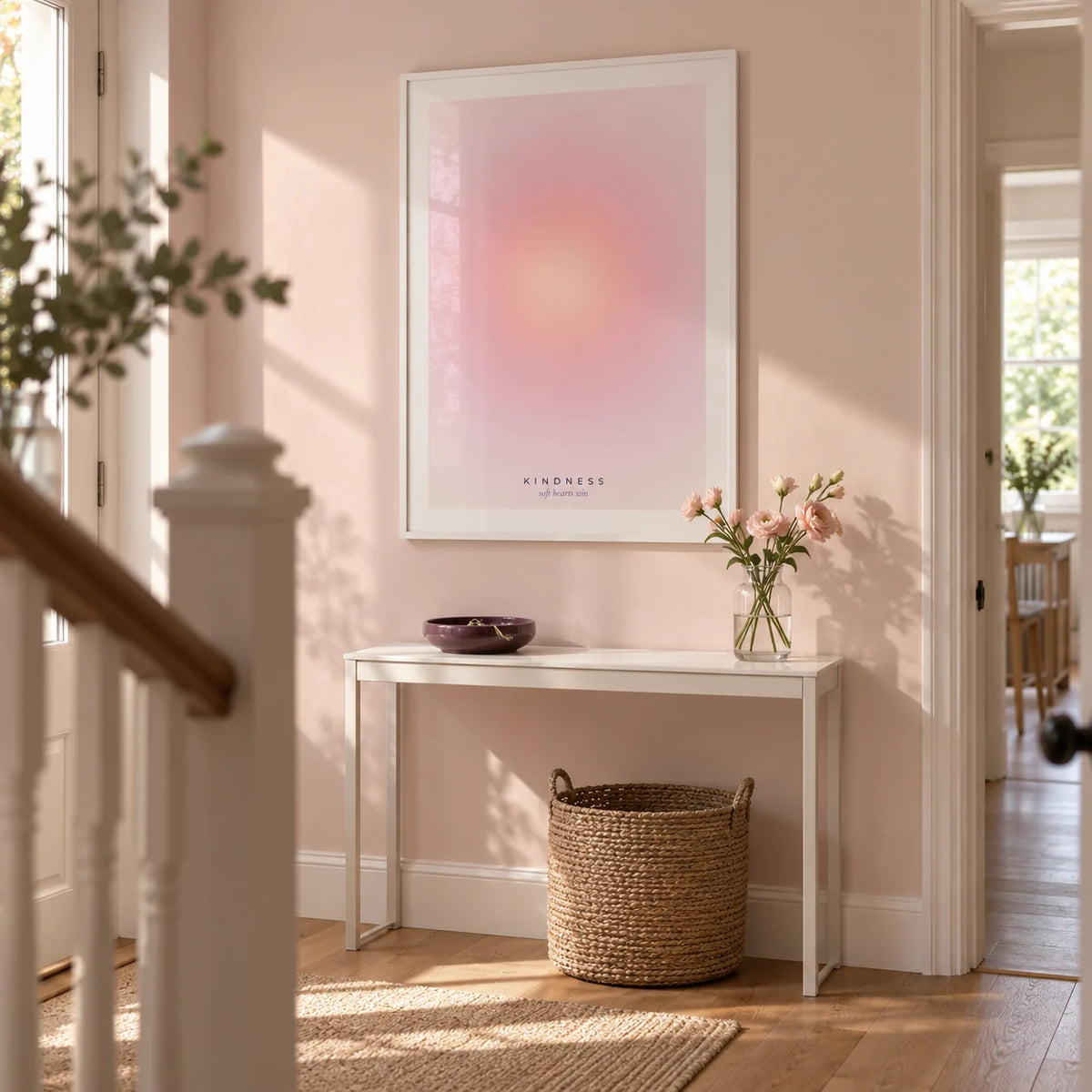 Kindness Poster, framed on the wall of a light modern hallway in a UK terraced home with pale blush walls and oak floorboards