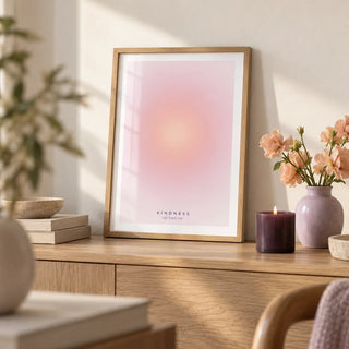 Kindness Poster, a small A4 framed print leaning on a pale oak sideboard in a living room