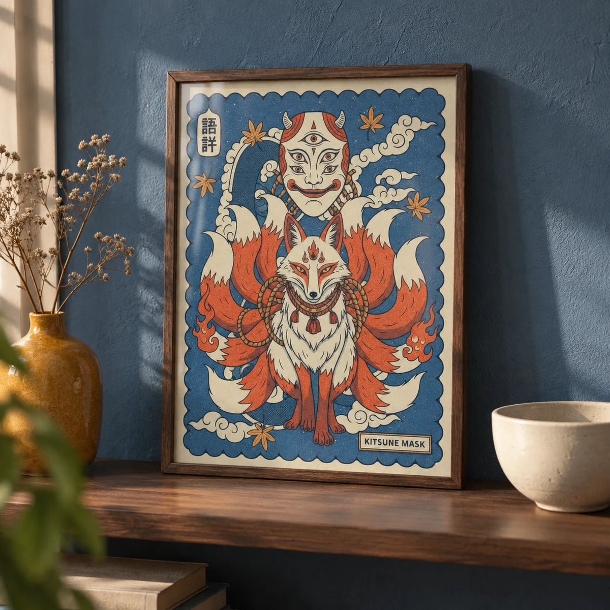 Kitsune Mask Art, a small A4 framed print leaning on a walnut shelf in a living room