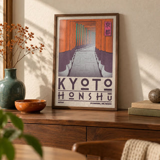 Kyoto Honshu Wall Art, a small A4 framed print leaning on a walnut sideboard in a living room