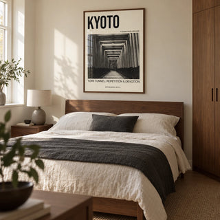 Kyoto Torii Tunnel Art Print, framed on the wall of a calm contemporary bedroom in a UK flat with a warm ivory wall and built-in walnut cupboards