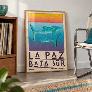 La Paz Mexico Poster shown in a living room, leaning on the floor by a chrome chair (frame not included)