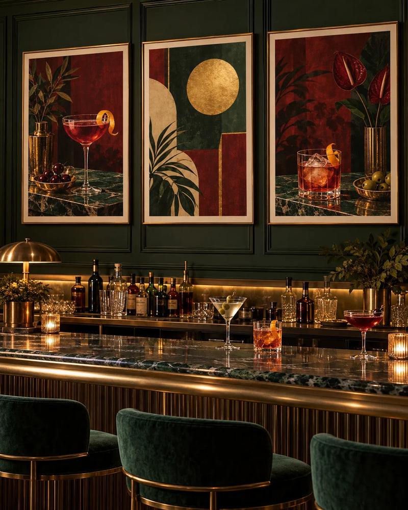 Cocktail bar with three framed prints above the bar