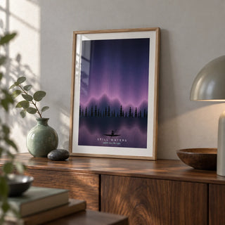 Lake Wall Art, a small A4 framed print leaning on a walnut sideboard in a living room