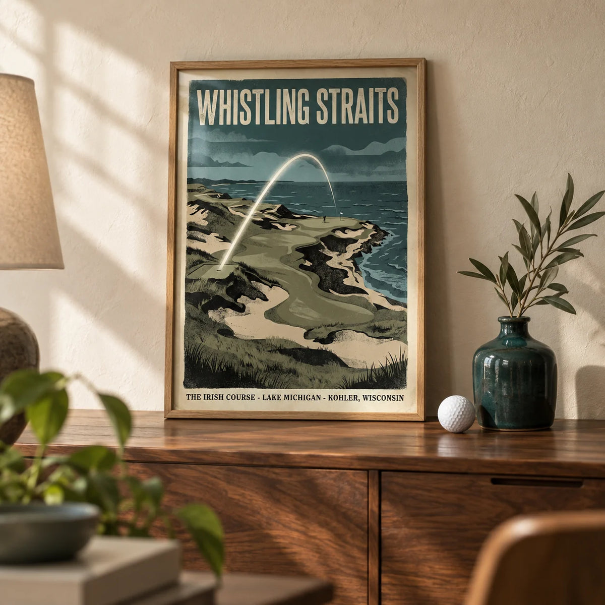 Lakeside Links Golf Poster, a small A4 framed print leaning on a walnut sideboard in a living room