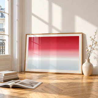 Cherry Ice Horizon Print, framed and leaning on the parquet floor of a bright living room