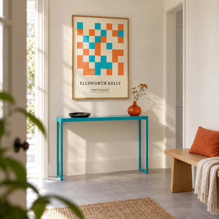 Large Geometric Wall Art, framed on the wall of a bright entrance hallway in a design-conscious UK flat with cream walls and large plain grey floor tiles
