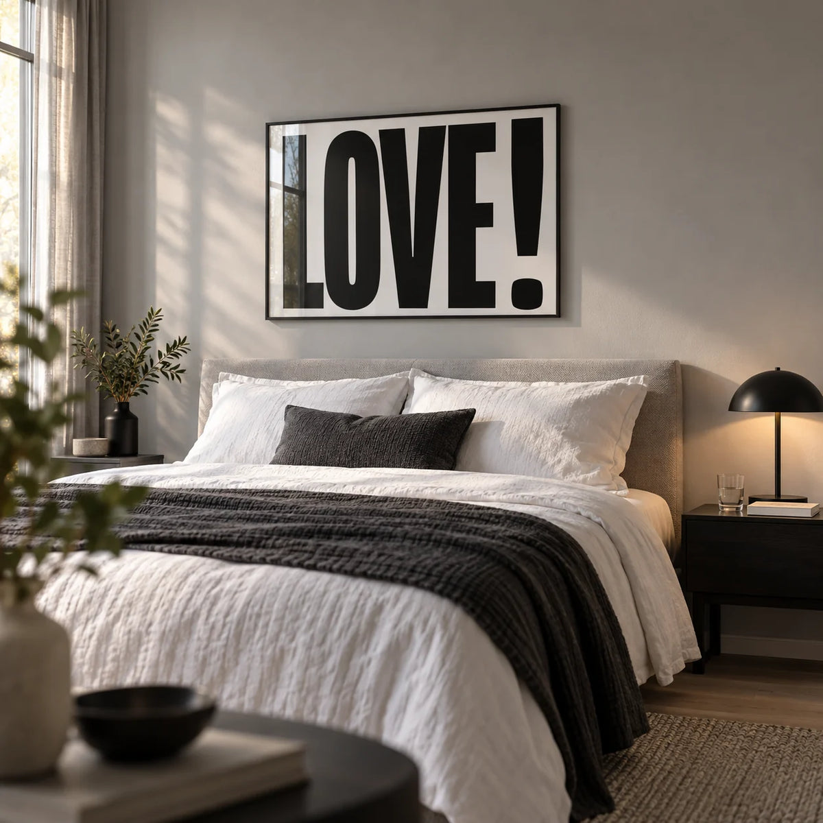 Large Motivational Posters, framed on the wall of a calm modern bedroom with a soft grey wall