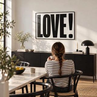 Large Motivational Posters, framed on the wall of a modern dining room with a white wall