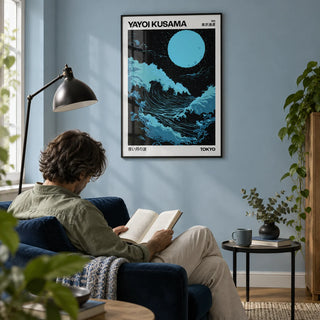 Large Ocean Wall Art, framed on the wall of a calm reading corner with a pale blue wall in a living room