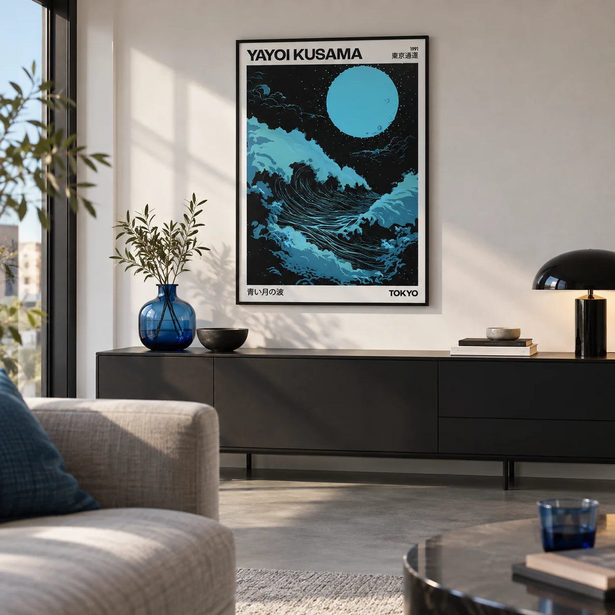 Large Ocean Wall Art, framed on the wall of a design-led city flat living room with a white wall and a concrete floor