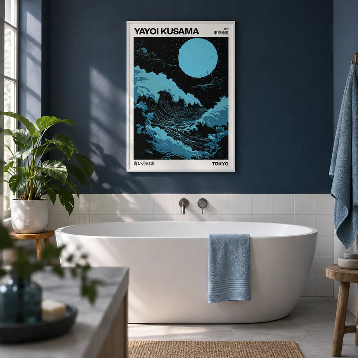 Large Ocean Wall Art, framed on the wall of a modern bathroom with a deep navy painted wall and plain white tiles