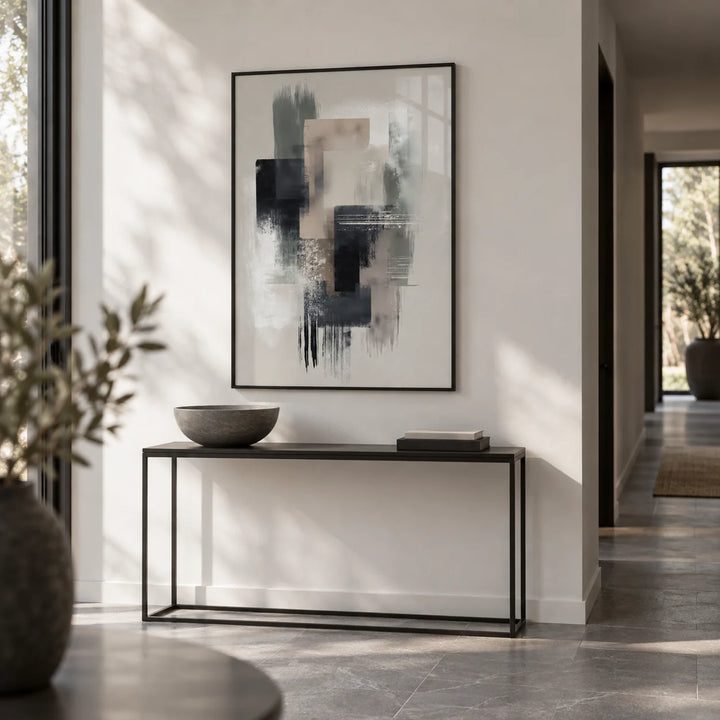 Large Wabi Sabi Print, framed on the wall of a minimal hallway with a white wall and a grey stone floor