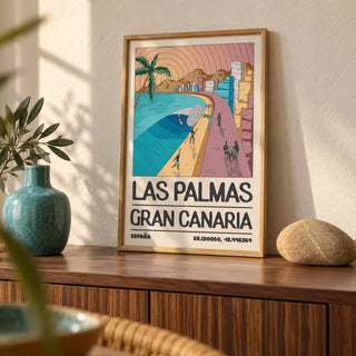 Las Palmas Art Print, a small A4 framed print leaning on a walnut side table in a hallway