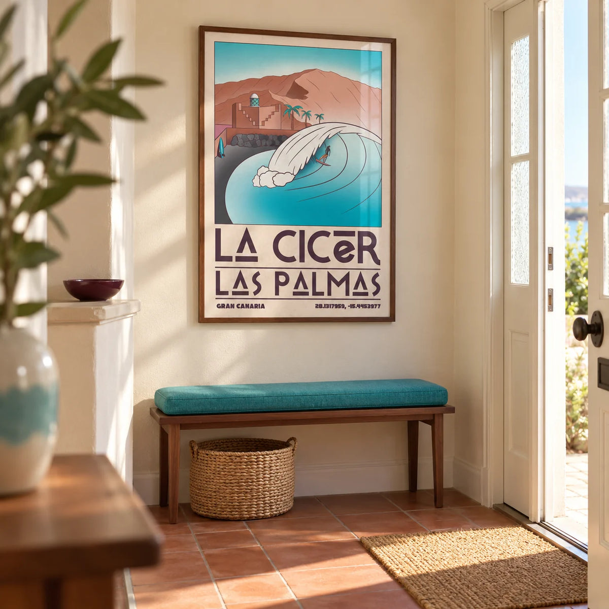 Las Palmas Wall Art, framed on the wall of a bright entrance hallway in a UK seaside home with warm cream walls and plain terracotta floor tiles