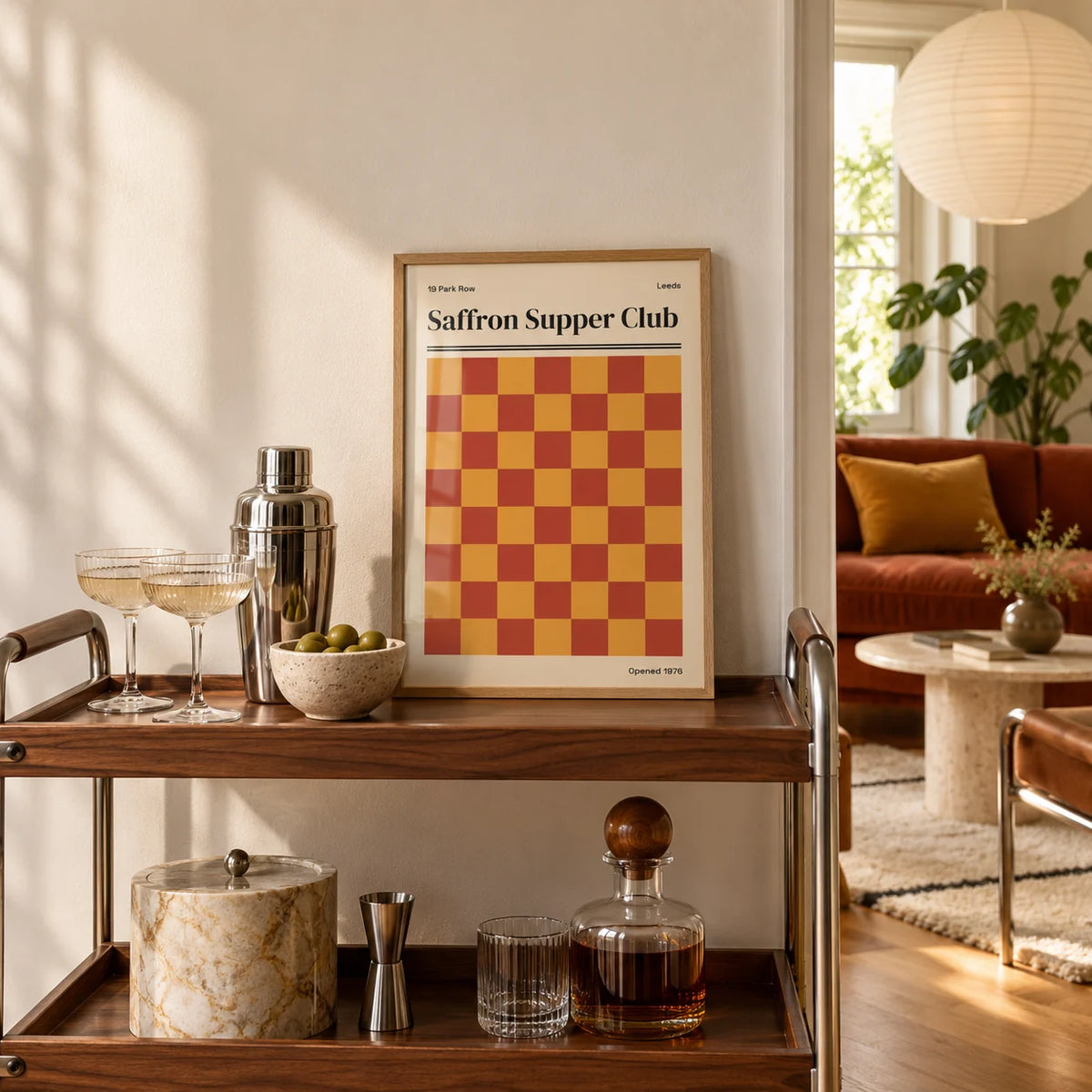 Leeds Print, a small A4 framed print leaning on a shelf in a living room