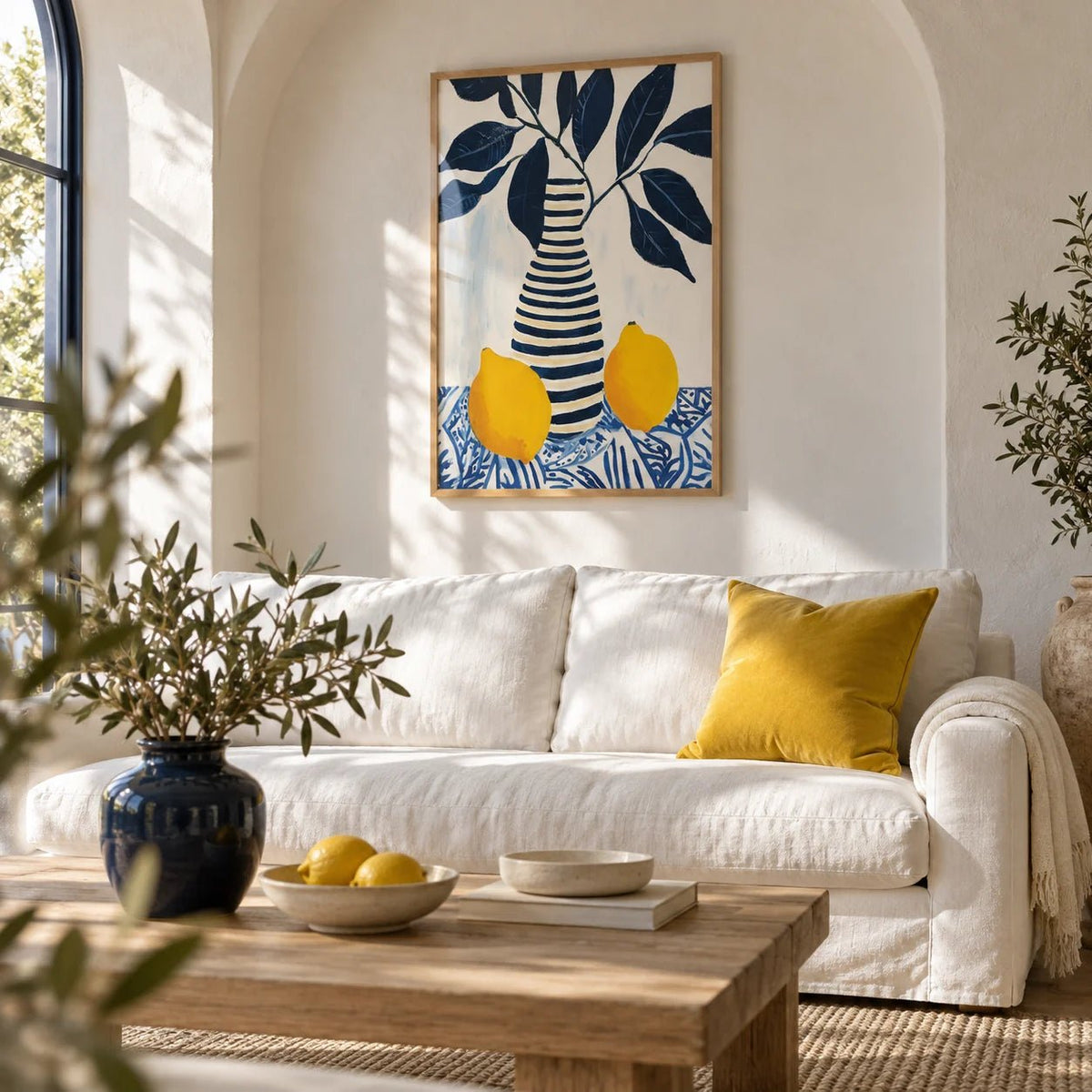 Lemon Art Print, framed on the wall of a Mediterranean living room with a plain arched niche