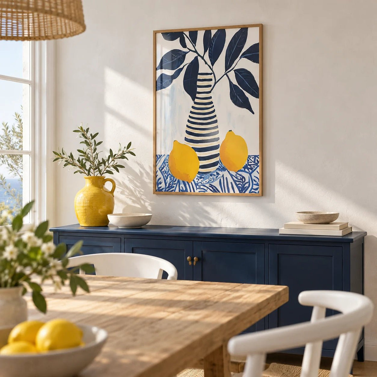 Lemon Art Print, framed on the wall of a sunny coastal dining room with white limewashed walls