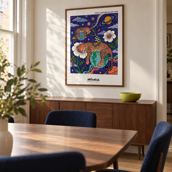 Leopard Galaxy Art Print, framed on the wall of a modern dining room in a UK terrace with a warm white wall and a walnut dining table