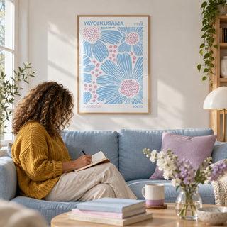 Light Blue Wall Art, framed on the wall of a bright living room with a white wall