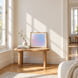 Lilac Haze Print, a small square framed print leaning on a small solid oak side table