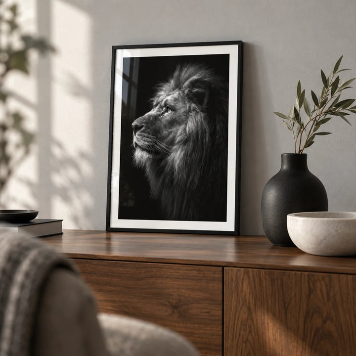 Lion Wall Art, a small A4 framed print leaning on a walnut sideboard in a living room