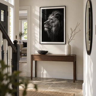 Lion Wall Art, framed on the wall of a spacious entrance hallway in a renovated UK semi-detached house with a warm white wall and a simple stone floor