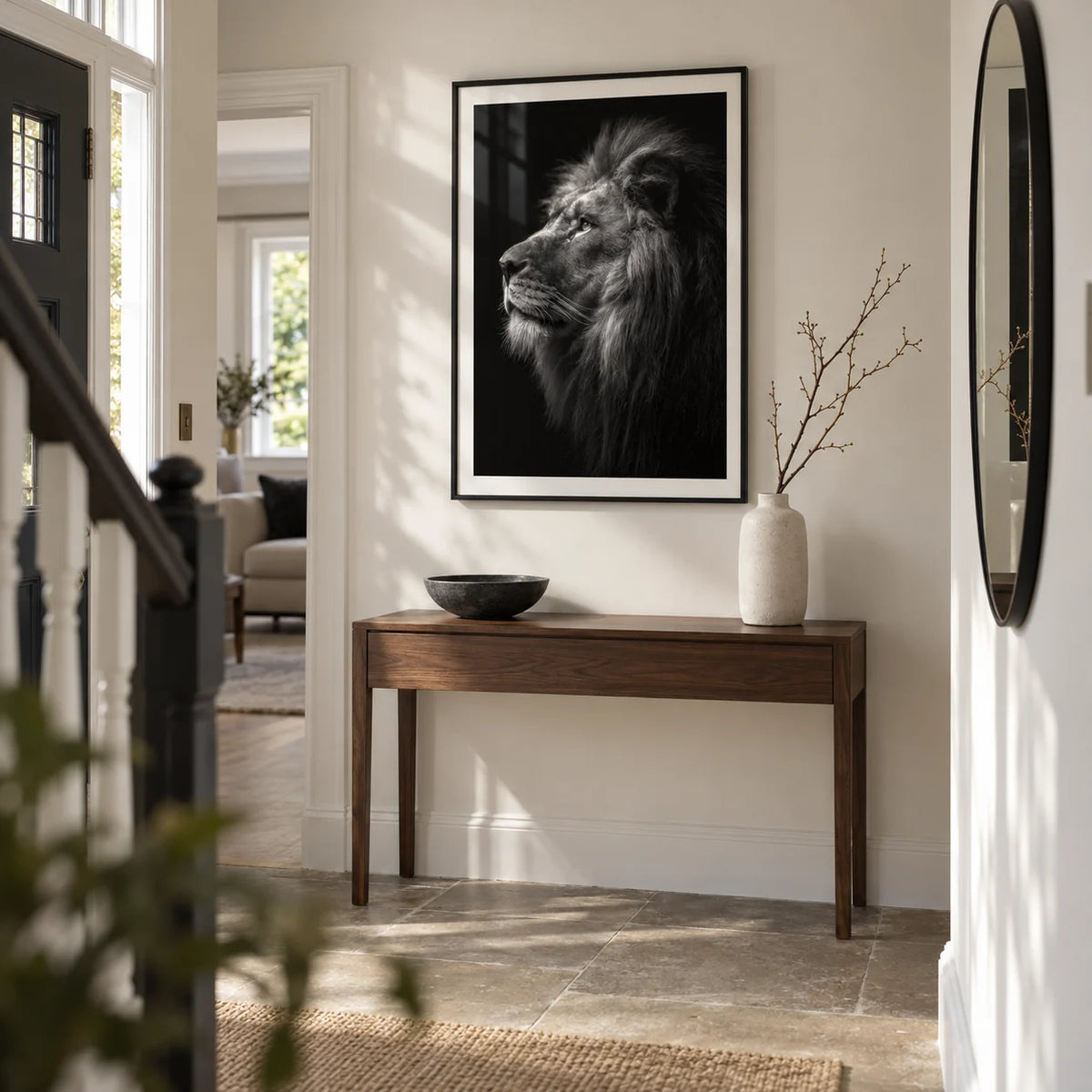 Lion Wall Art, framed on the wall of a spacious entrance hallway in a renovated UK semi-detached house with a warm white wall and a simple stone floor